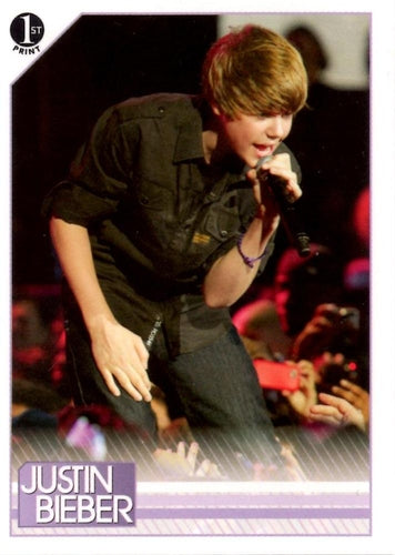 #107 Justin added a personal touch to his performan - 2010 Panini Justin Bieber