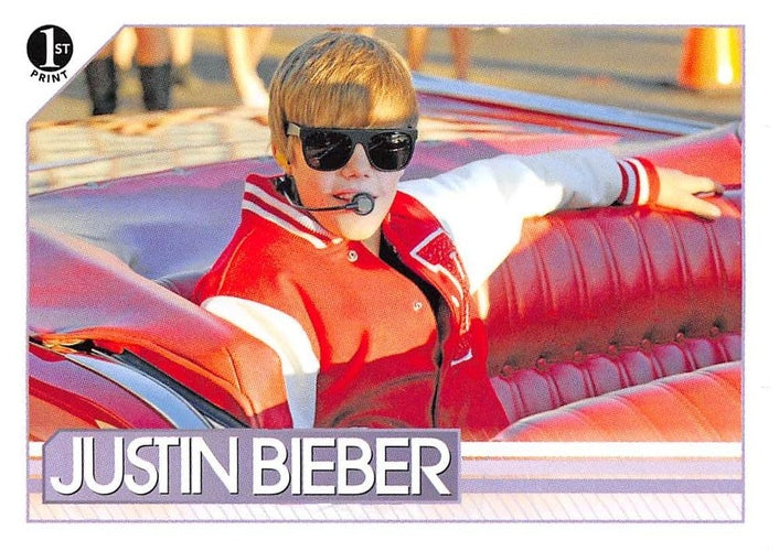#25 Pulling up to the Nokia Theatre in a sweet, re - 2010 Panini Justin Bieber