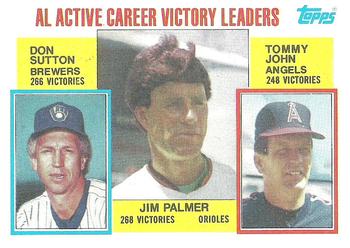 #715 AL Active Career Victory Leaders Jim Palmer / Don Sutton / Tommy John - Baltimore Orioles / Milwaukee Brewers / California Angels - 1984 Topps Baseball