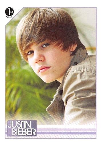 #85 Unlike his visit to Auckland which included bu - 2010 Panini Justin Bieber
