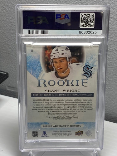 2022-23 Upper Deck Artifacts Emerald Dual Patch Rookie Auto Shane Wright /15 PSA 8