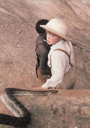 #44 Meto saves Indy from a slithering snake. An - 1992 Pro Set Young Indiana Jones