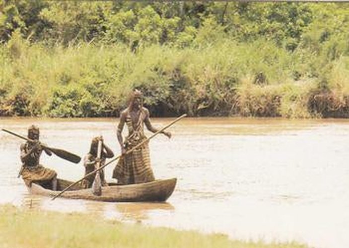 #91 Three natives arrive in a dugout canoe. They - 1992 Pro Set Young Indiana Jones