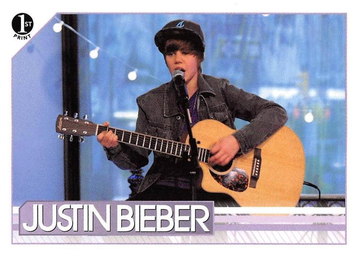 #56 Among the songs in the set list he played whil - 2010 Panini Justin Bieber