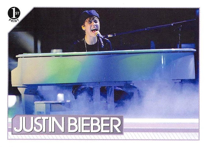 #86 Having taught himself the piano, Justin put hi - 2010 Panini Justin Bieber