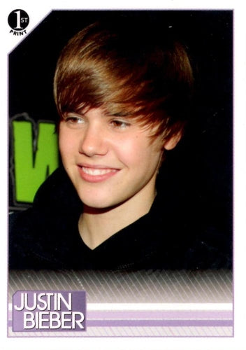 #97 On March 23, 2010, Justin had a lot to smile a - 2010 Panini Justin Bieber