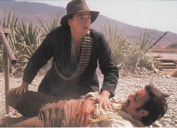 #19 Josâ sneaks through the crowd in Ciudad Guer - 1992 Pro Set Young Indiana Jones