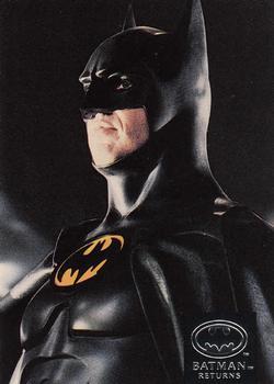 #90 Some finished Batman cowls are displayed in t - 1992 Stadium Club Batman Returns